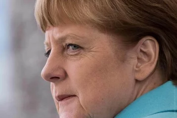 Фото: Названа причина проблем с дыханием у Ангелы Меркель 1