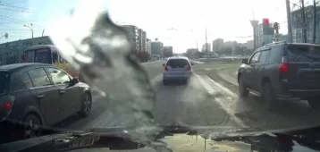 Фото: В Кемерове водителя наказали за проезд на красный свет  1