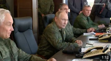 Фото: Путин в военной форме прибыл на полигон Мулино в Нижегородской области 1