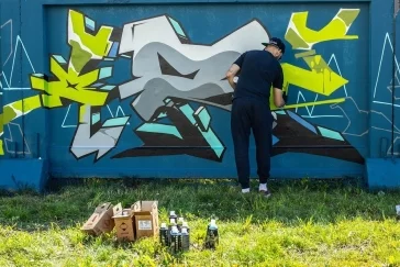 Фото: Известный художник нарисовал в Кемерове граффити 2
