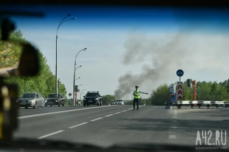 Фото: Крупный пожар на Тухачевского, 55 в Кемерове 31