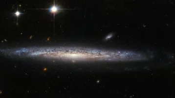 Фото: Учёные рассказали о связи между формой галактик и их возрастом 1