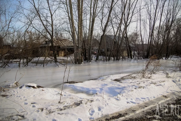 Фото: Дело не только в снеге: почему Кемерово топит в неожиданных местах  21