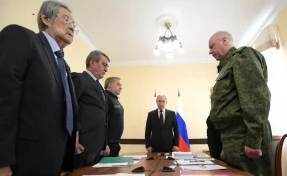 Тулеев попросил у Путина прощения за пожар в Кемерове