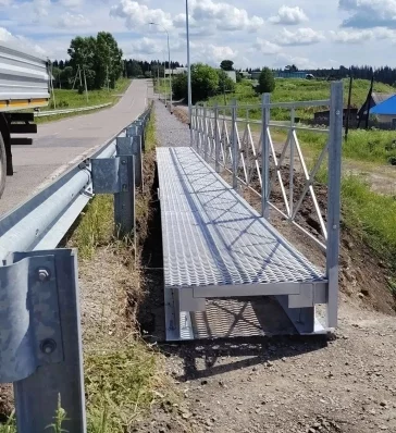 Фото: В кузбасской Барановке строят два километра тротуаров и пешеходный мост 3