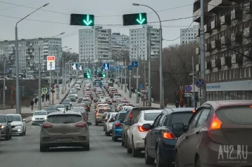 Фото: Кемеровчане встали в 9-балльных пробках на центральных улицах города  1