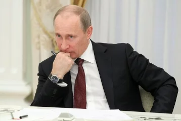 Фото: Путину в мире доверяют больше людей, чем Трампу 1