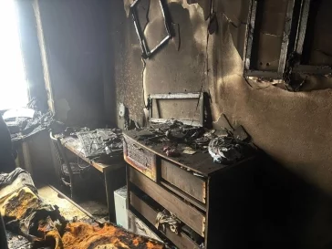 Фото: В Кузбассе на пожаре в квартире погибли мать и двое маленьких детей 1