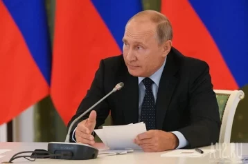 Фото: Кремль: Владимир Путин проголосовал на выборах президента России  1