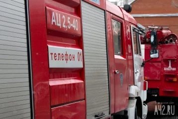 Фото: Видео горящего гаража с автомобилем в Кемерове попало в соцсети 1