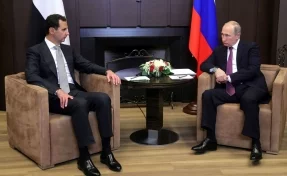 Востоковед расшифровал символы на картине, подаренной Башаром Асадом Путину