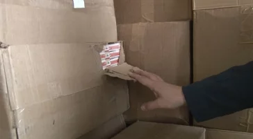 Фото: В Кузбассе у предпринимателя нашли контрафактные сигареты на 6,8 млн рублей 2