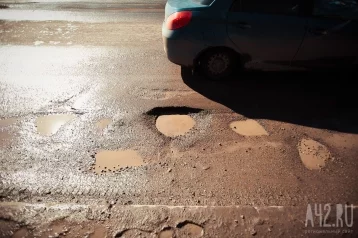 Фото: «Требуется замена»: власти ответили на вопрос о ямочном ремонте разбитых дорог в «Кемерово-Сити» 1