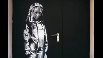 Фото: В Париже украли работу уличного художника Бэнкси, посвящённую памяти жертв терактов 1