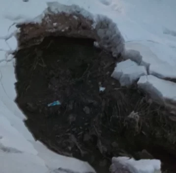 Фото: В Кемерове вода затопила Октябрьский проспект 1