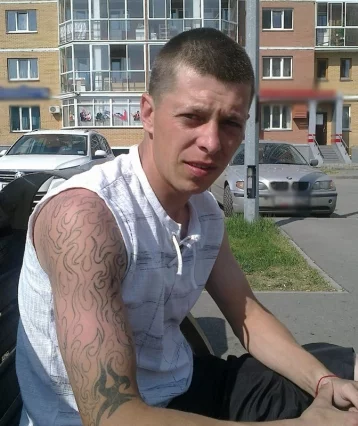 Фото: Подозревается в преступлении: в Кузбассе разыскивают мужчину с татуировкой тигра 1