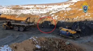 Фото: Появилось видео с места гибели машиниста бульдозера при обрушении карьера в Кузбассе 1