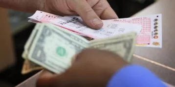 Фото: Американка выиграла в лотерею миллион долларов по совету продавца 1