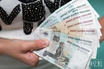 Фото: Россияне за месяц взяли рекордные 700 миллиардов рублей потребительских кредитов  1