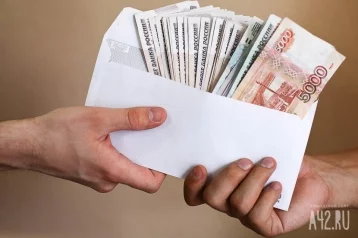 Фото: Названо количество россиян, получающих зарплату «в конверте» 1