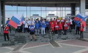 В Кемерове провели флешмоб «Под флагом России к спортивным рубежам»