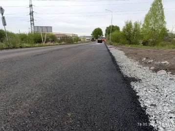 Фото: В кемеровском микрорайоне Комиссарово выполнили ремонт дороги 1
