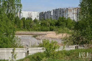 Фото: Кемеровчане возмущены засыпкой пруда на ФПК 3