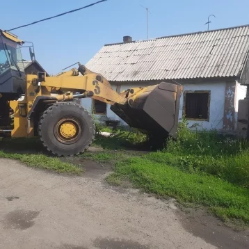 Фото: После прямого эфира губернатора в Кузбассе принялись сносить дома и ловить собак 1