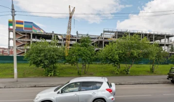 Фото: Названы сроки открытия недостроенного торгового комплекса на ФПК в Кемерове 1