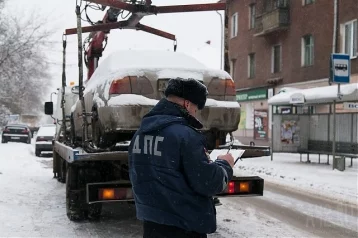 Фото: Более 80 водителей Кемерова временно лишились своих машин 1