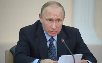 Фото: Путин: в выборы президента США могли вмешаться американские хакеры  1