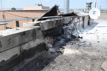 Фото: В Белгороде беспилотник рухнул на офисное здание и загорелся  1