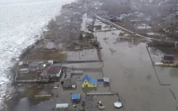 Фото: МЧС показало кадры из затопленной деревни в Юргинском округе 1