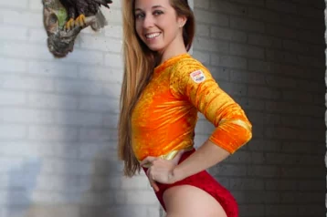 Фото: Призёрка чемпионата мира по гимнастике призналась, что снималась в порно 1
