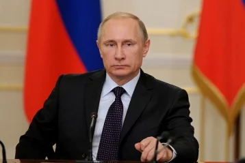 Фото: Путин поставил перед главой МЧС «значимую задачу» после трагедии в Кемерове 1