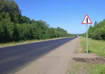 Фото: В Кузбассе участок трассы Томск — Мариинск отремонтировали на 70% 2