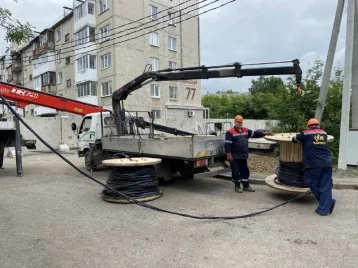 Фото: Кемеровские энергетики благодаря нацпроекту стали быстрее строить воздушные линии электропередачи 1