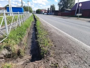 Фото: В Кемерове жителей деревни Красная избавили от подтопления домов и дорог 1