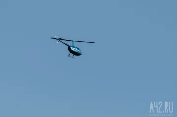Фото: В Кузбассе один человек погиб и один пострадал при аварийной посадке вертолёта 1