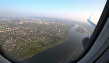 Фото: Пассажир снял на видео снижение и посадку самолёта в Кемерове 1